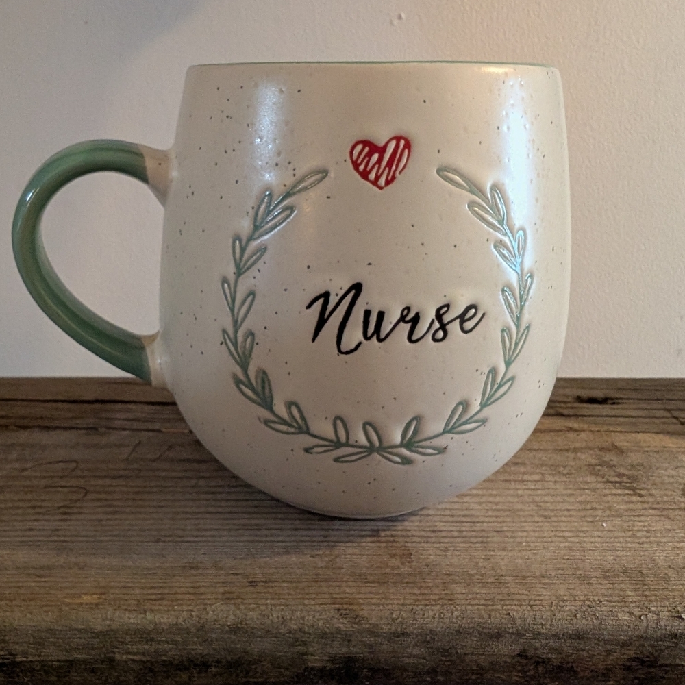Charming Cream and Green Nurse Mug with Heart Design